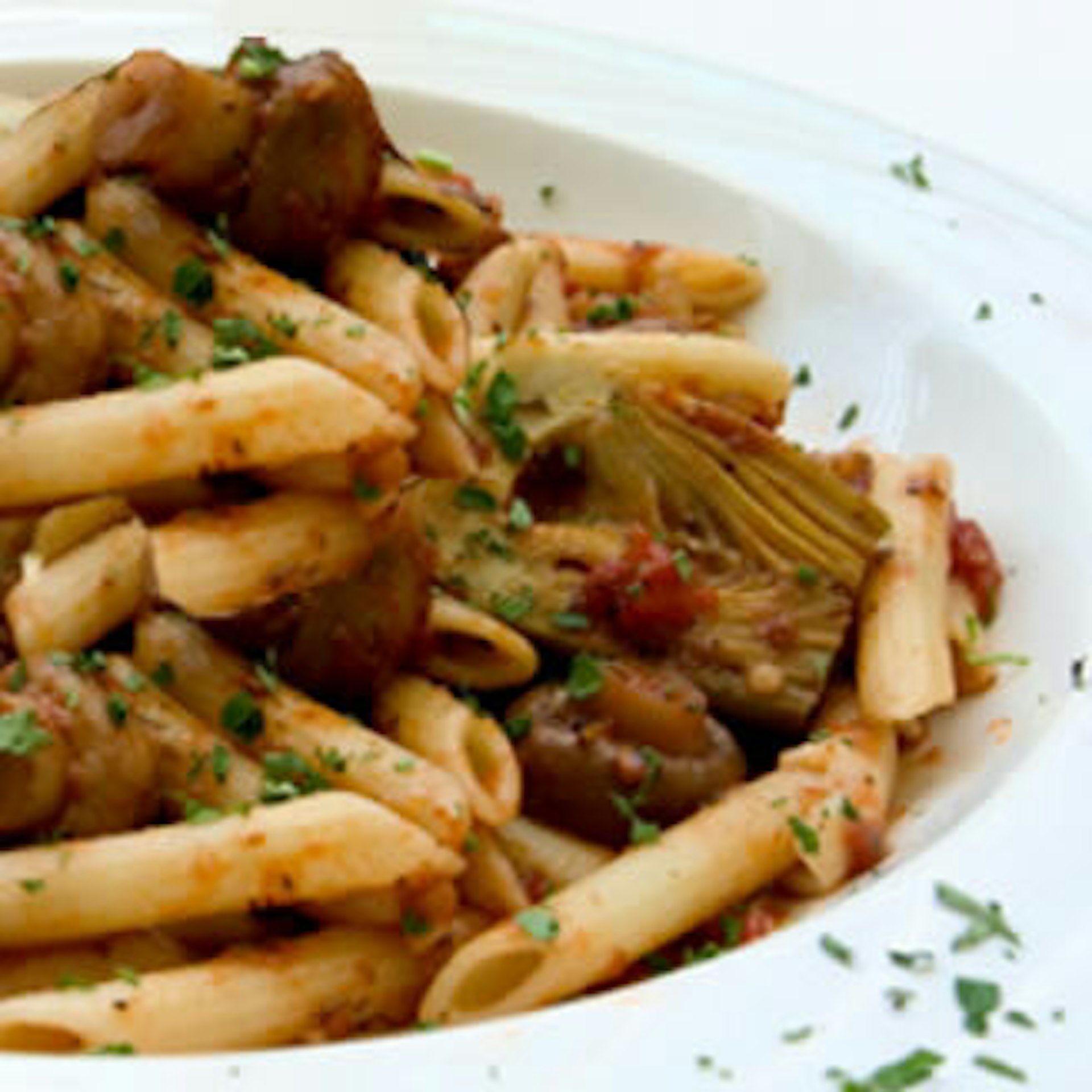 Premium Photo  Penne rigate pasta with pasta with ham and pepper