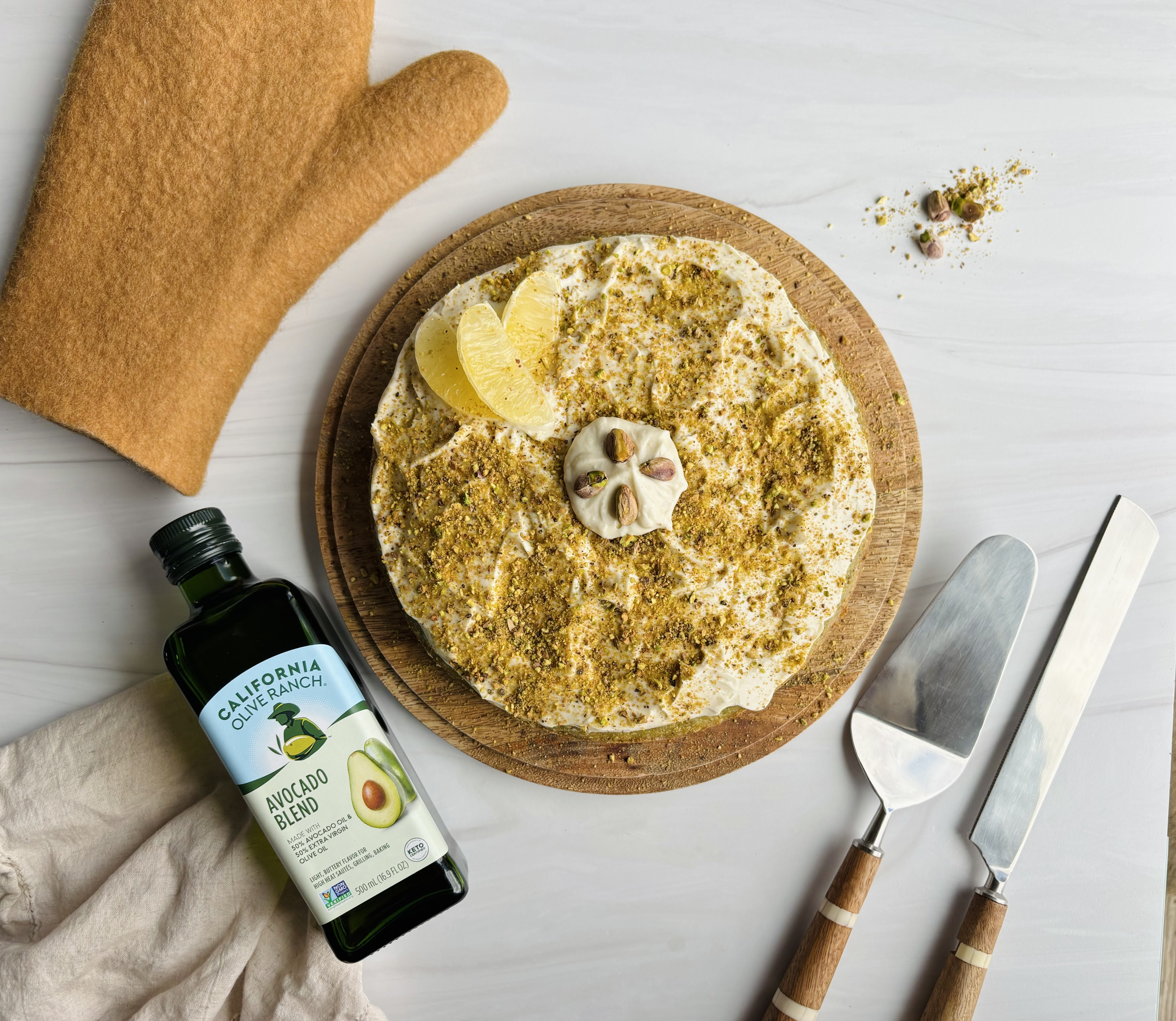 Pistachio and Lemon Cake with Cardamom Whipped Cream Cheese Frosting | California Olive Ranch