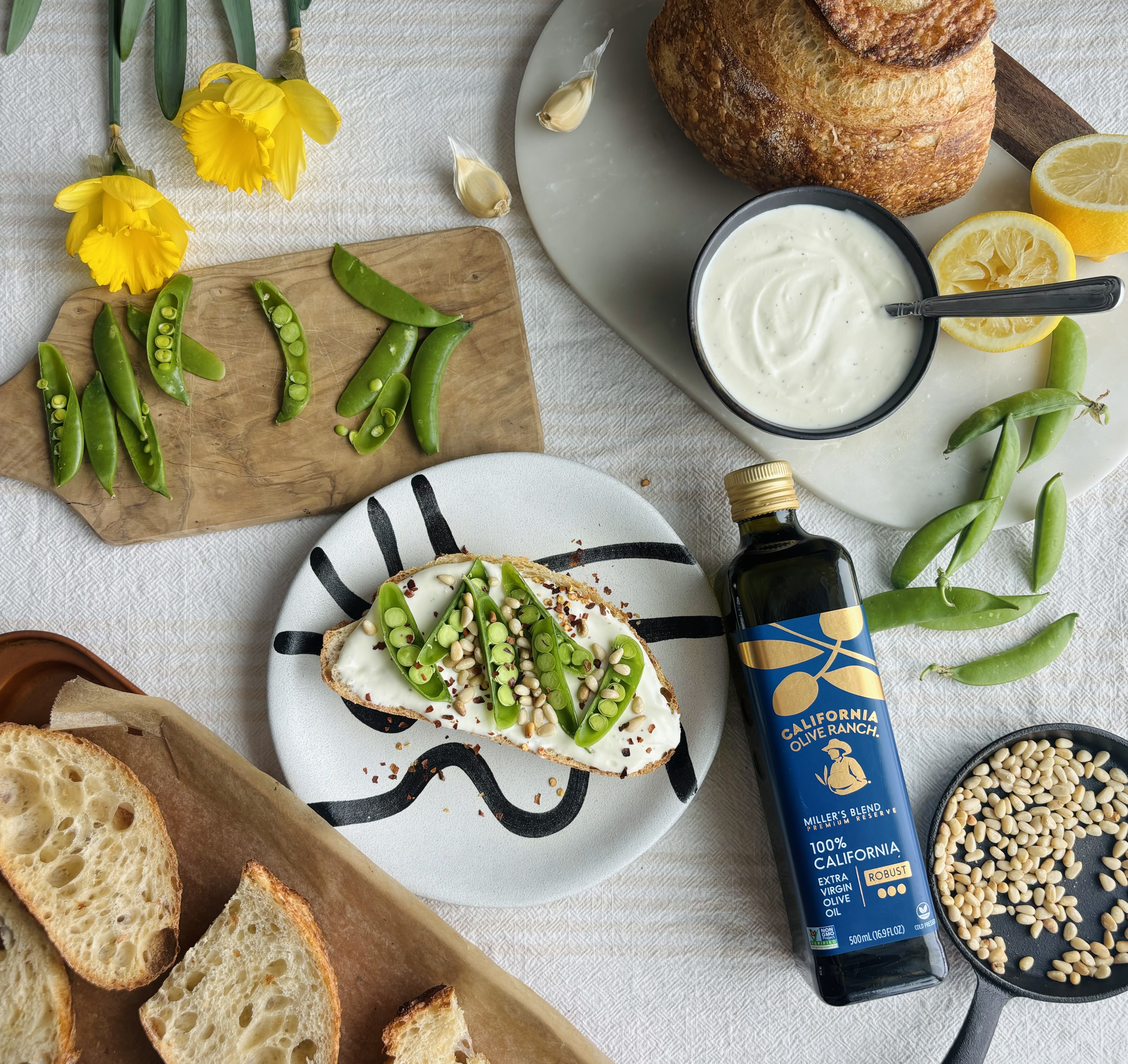 Garlic Honey Whipped Ricotta with Snap Pea & Pine Nut Toast | California Olive Ranch