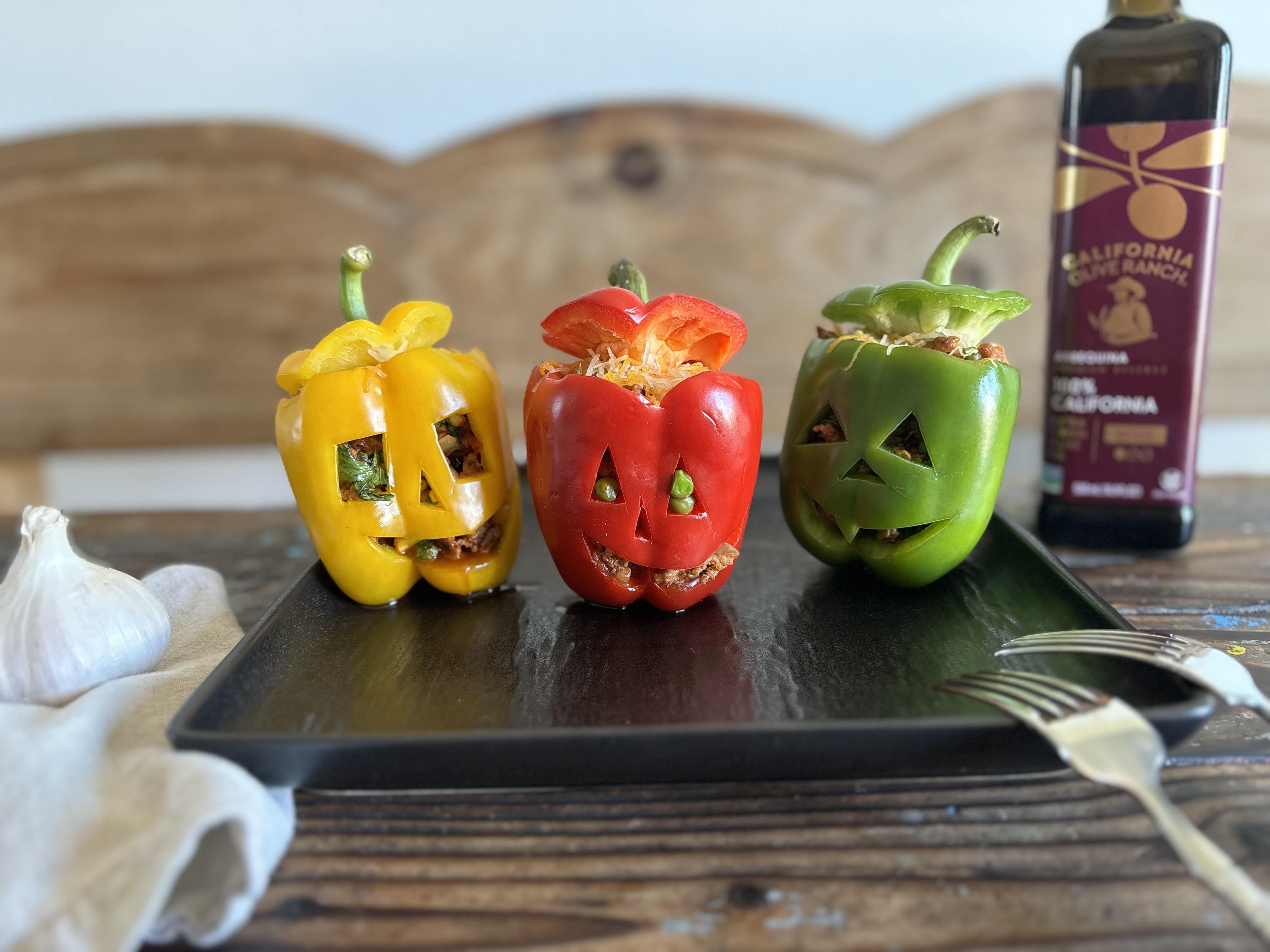 Jack-o-Lantern Stuffed Bell Peppers | California Olive Ranch