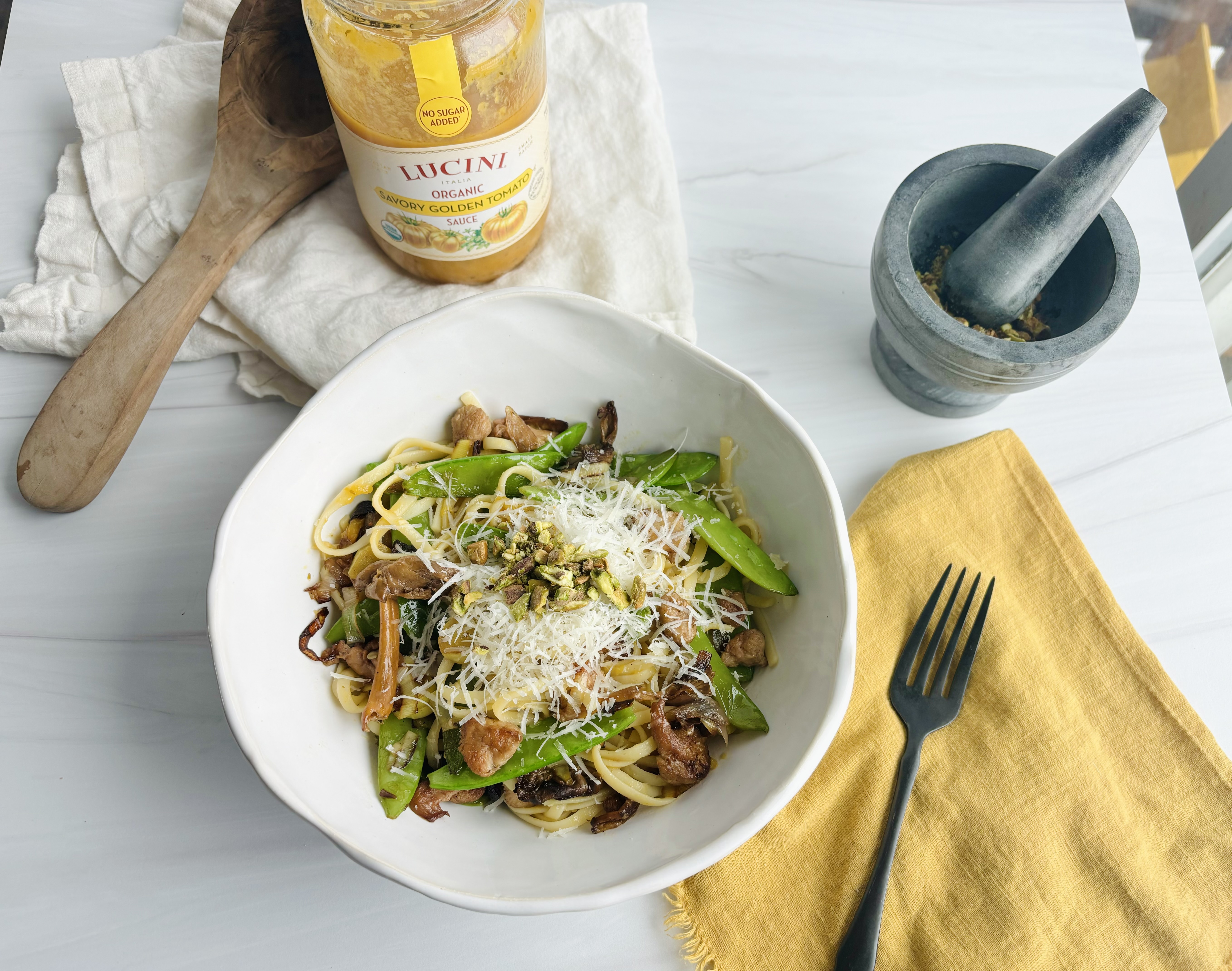 Parmesan, Pea and Pistachio Pasta With Golden Tomato Sauce and Mushrooms | California Olive Ranch